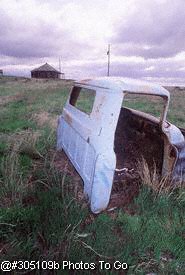 Abandoned truck on deserted farm